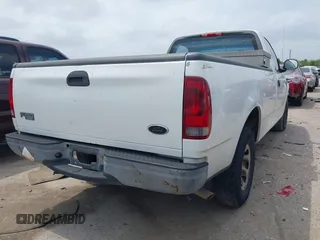 2002 Ford F-150 XL with VIN 1FTPF17L22NA33980, listed as a IAAI auction lot 41968252 with Not provided miles and . Bid and sale history available at DreamBid. Image 4.