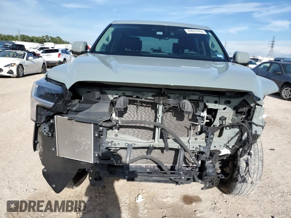 2023 Toyota Tundra 2WD SR5 with VIN 5TFLA5AB6PX024909, listed as a Copart auction lot 69022264 with 23,334 mi miles and Salvage Title. Bid and sale history available at carsss.com. Image 5.