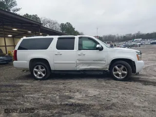 2007 Chevrolet Suburban LT with VIN 1GNFC16J17J187848, listed as a IAAI auction lot 41553241 with 1 mi miles. Bid and sale history available at carsss.com. Image 13.