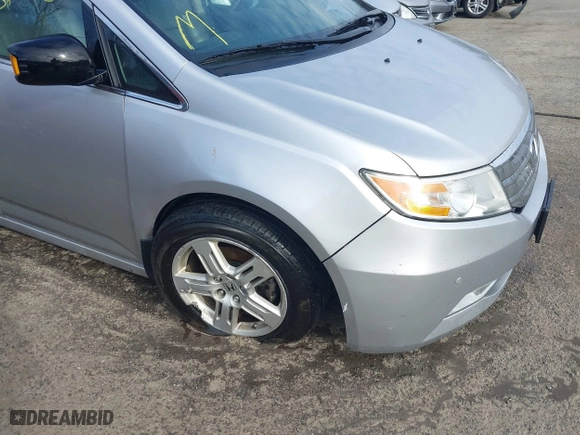 2013 Honda Odyssey Touring with VIN 5FNRL5H97DB021403, listed as a IAAI auction lot 41606606 with 223,547 mi miles. Bid and sale history available at carsss.com. Image 6.