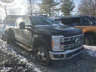 2023 Ford F-350 XL with VIN 1FT8W3DM2PED14021, listed as a Copart auction lot 87533355 with 86,991 mi miles and Salvage Title. Bid and sale history available at DreamBid. Image 4.