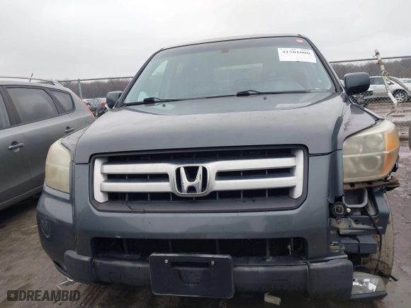 2006 Honda Pilot EX-L with RES with VIN 2HKYF18676H551683, listed as a IAAI auction lot 41501000 with 288,473 mi miles. Bid and sale history available at carsss.com. Image 12.