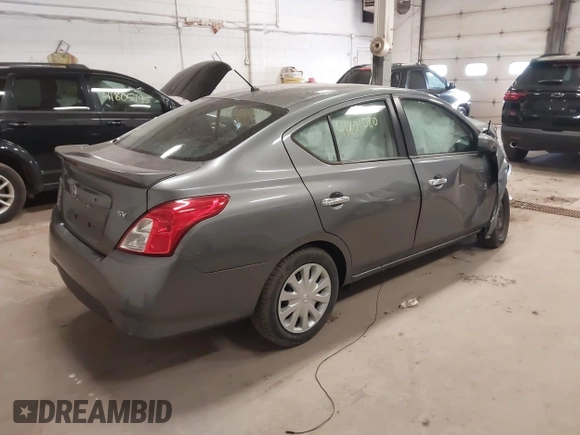 2018 Nissan Versa Sedan SV with VIN 3N1CN7AP7JL860195, listed as a IAAI auction lot 41801080 with 103,984 mi miles. Bid and sale history available at carsss.com. Image 4.