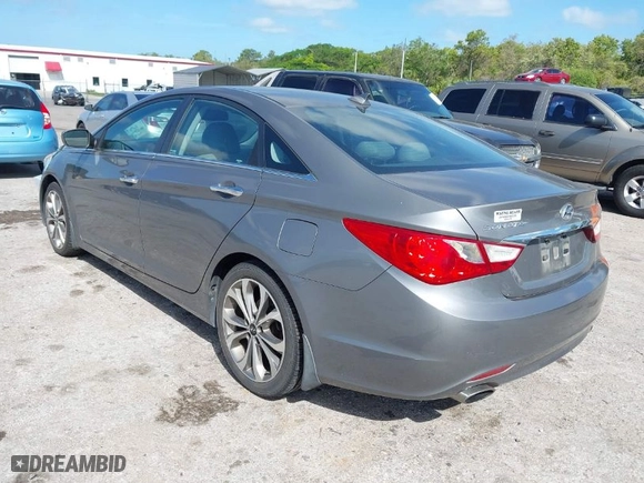 2013 Hyundai Sonata SE with VIN 5NPEC4AC2DH785966, listed as a IAAI auction lot 41966749 with 122,242 mi miles. Bid and sale history available at carsss.com. Image 3.