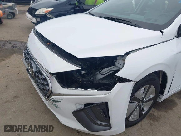 2022 Hyundai Ioniq Blue with VIN KMHC65LC7NU280672, listed as a IAAI auction lot 42432826 with 11,486 mi miles and . Bid and sale history available at DreamBid. Image 6.