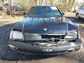 1999 Mercedes-Benz SL-Class with VIN WDBFA68F9XF187036, listed as a IAAI auction lot 41542221 with 114,602 mi miles. Bid and sale history available at carsss.com. Image 6.
