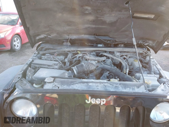 2011 Jeep Wrangler Rubicon with VIN 1J4HA6D11BL564211, listed as a IAAI auction lot 41242240 with 124,039 mi miles and . Bid and sale history available at carsss.com. Image 10.