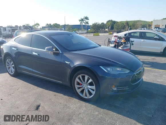 2015 Tesla Model S 85D with VIN 5YJSA1H46FF082264, listed as a IAAI auction lot 42068959 with 98,693 mi miles. Bid and sale history available at carsss.com. Image 1.