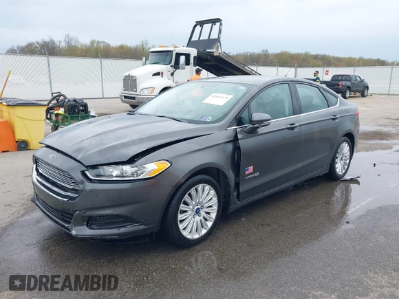 2015 Ford Fusion SE Hybrid with VIN 3FA6P0LU9FR232583, listed as a IAAI auction lot 42012175 with 139,309 mi miles and . Bid and sale history available at DreamBid. Image 18.