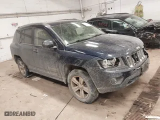 2014 Jeep Compass Latitude with VIN 1C4NJDEB4ED884111, listed as a IAAI auction lot 41346485 with 142,446 mi miles. Bid and sale history available at carsss.com. Image 1.