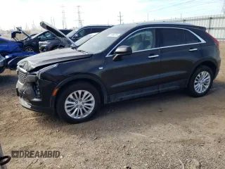 2024 Cadillac XT4 AWD Luxury with VIN 1GYFZBR4XRF199970, listed as a Copart auction lot 71496774 with 4,512 mi miles and Salvage Title. Bid and sale history available at carsss.com. Image 1.