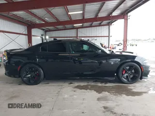 2019 Dodge Charger SRT Hellcat with VIN 2C3CDXL97KH552439, listed as a IAAI auction lot 41813879 with 58,921 mi miles and . Bid and sale history available at DreamBid. Image 13.