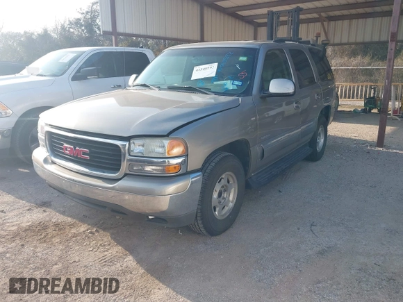 2003 GMC Yukon SLT with VIN 1GKEC13Z43R163266, listed as a IAAI auction lot 41540592 with 173,804 mi miles. Bid and sale history available at carsss.com. Image 2.