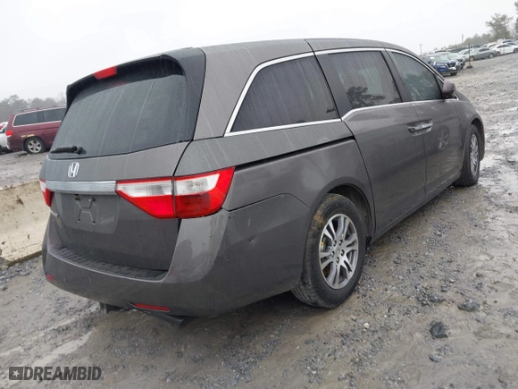 2011 Honda Odyssey EX-L with VIN 5FNRL5H6XBB100535, listed as a IAAI auction lot 41544196 with 261,000 mi miles. Bid and sale history available at carsss.com. Image 4.