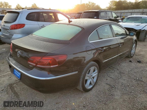 2015 Volkswagen CC R-Line with VIN WVWBP7AN0FE804012, listed as a Copart auction lot 70457953 with 98,798 mi miles. Bid and sale history available at carsss.com. Image 3.