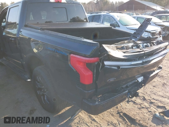2023 Ford F-150 Lightning Pro with VIN 1FT6W1EV7PWG33511, listed as a IAAI auction lot 41761149 with 10,501 mi miles and . Bid and sale history available at DreamBid. Image 6.