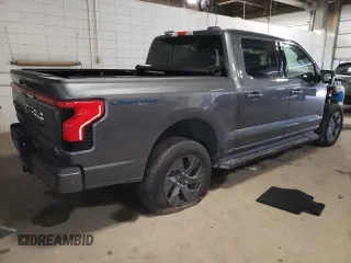 2022 Ford F-150 Lightning Pro z VIN 1FT6W1EV7NWG10033, wystawiony jako Copart lot #81516533 z przebiegiem 11 282 mil mil oraz Szkody całkowita. Historia ofert i sprzedaży dostępna na DreamBid. Obrazek 3.