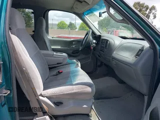 1998 Ford F-150 with VIN 1FTZX1760WKA90900, listed as a IAAI auction lot 42239510 with 198,405 mi miles and . Bid and sale history available at DreamBid. Image 5.