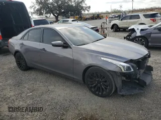 2015 Cadillac CTS Luxury RWD with VIN 1G6AR5SX0F0115632, listed as a Copart auction lot 45395555 with 140,119 mi miles and Salvage Title. Bid and sale history available at DreamBid. Image 4.