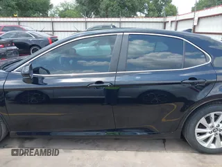 2023 Toyota Camry LE z VIN 4T1C11AK3PU182887, wystawiony jako IAAI lot #42156807 z przebiegiem 33 019 mil mil oraz . Historia ofert i sprzedaży dostępna na DreamBid. Obrazek 14.