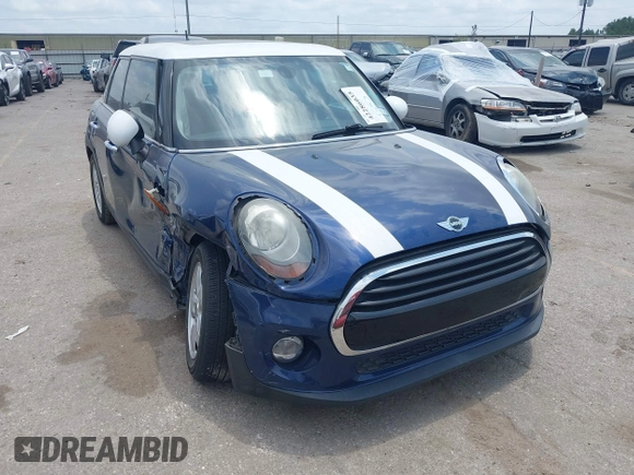 2017 MINI Hardtop 4 Door Cooper with VIN WMWXU1C59H2E18069, listed as a IAAI auction lot 42286035 with 85,835 mi miles and . Bid and sale history available at DreamBid. Image 1.