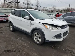 2016 Ford Escape SE with VIN 1FMCU9G91GUC68547, listed as a Copart auction lot 52770635 with 100,111 mi miles and Salvage Title. Bid and sale history available at DreamBid. Image 4.