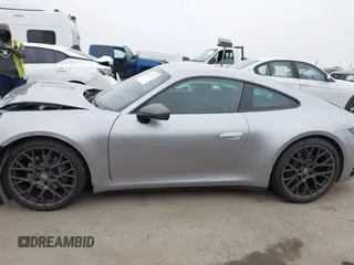 2023 Porsche 911 Carrera with VIN WP0AA2A93PS206048, listed as a IAAI auction lot 42022225 with 6,439 mi miles and . Bid and sale history available at DreamBid. Image 14.