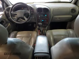 2002 Oldsmobile Bravada z VIN 1GHDT13S022177127, wystawiony jako Copart lot #57089015 z przebiegiem 168 771 mil mil oraz Nie do naprawy. Historia ofert i sprzedaży dostępna na DreamBid. Obrazek 8.