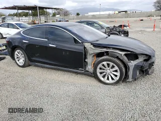 2016 Tesla Model S 70 kWh Battery with VIN 5YJSA1E19GF131999, listed as a Copart auction lot 49355665 with 96,978 mi miles and Salvage Title. Bid and sale history available at carsss.com. Image 4.