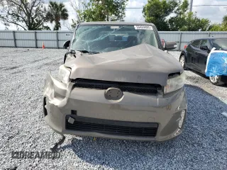 2014 Scion xB z VIN JTLZE4FE5EJ061689, wystawiony jako Copart lot #55420885 z przebiegiem 96 970 mil mil oraz Szkoda całkowita • Salvage title. Historia ofert i sprzedaży dostępna na DreamBid. Obrazek 5.