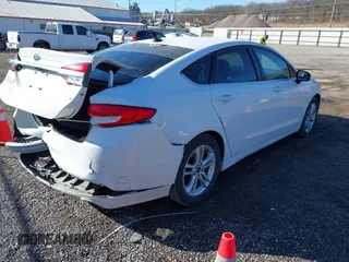 2018 Ford Fusion SE with VIN 3FA6P0H75JR171339, listed as a IAAI auction lot 41445890 with 76,731 mi miles. Bid and sale history available at carsss.com. Image 4.