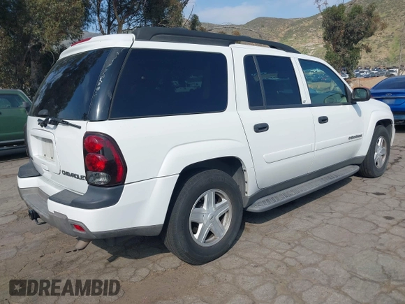2003 Chevrolet TrailBlazer EXT LT with VIN 1GNES16S236228394, listed as a IAAI auction lot 42043190 with 144,407 mi miles. Bid and sale history available at carsss.com. Image 4.
