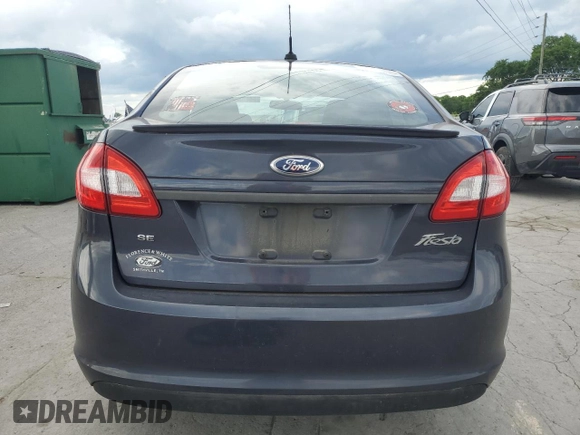 2012 Ford Fiesta SE z VIN 3FADP4BJ8CM194262, wystawiony jako Copart lot #56685845 z przebiegiem 367 579 mil mil oraz Szkoda całkowita • Salvage title. Historia ofert i sprzedaży dostępna na DreamBid. Obrazek 6.