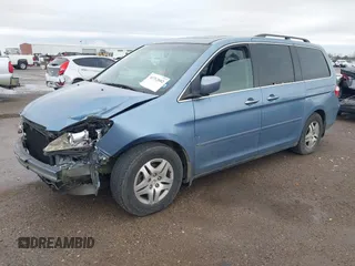 2007 Honda Odyssey EX-L z VIN 5FNRL38647B139018, wystawiony jako IAAI lot #41712602 z przebiegiem 243 473 mil mil oraz . Historia ofert i sprzedaży dostępna na DreamBid. Obrazek 2.