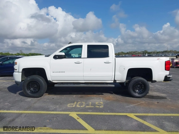 2016 Chevrolet Silverado 1500 LT with VIN 3GCUKREC3GG116107, listed as a IAAI auction lot 41490638 with 93,669 mi miles. Bid and sale history available at carsss.com. Image 14.