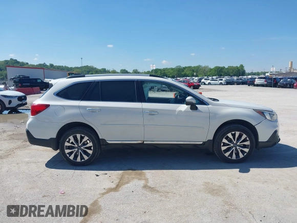 2018 Subaru Outback Touring with VIN 4S4BSATC5J3336205, listed as a IAAI auction lot 42201530 with 103,362 mi miles and . Bid and sale history available at DreamBid. Image 13.