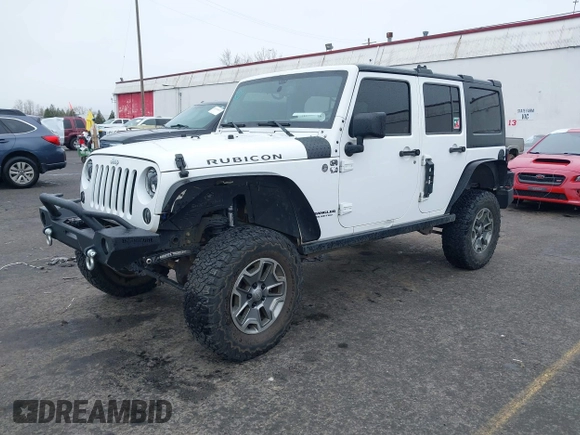 2014 Jeep Wrangler Unlimited Rubicon with VIN 1C4BJWFGXEL283929, listed as a IAAI auction lot 41812052 with 137,790 mi miles and . Bid and sale history available at DreamBid. Image 17.