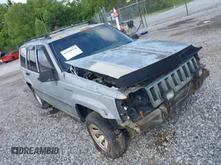 1995 Jeep Grand Cherokee Laredo with VIN 1J4GZ58S6SC756256, listed as a IAAI auction lot 42169534 with 255,516 mi miles. Bid and sale history available at carsss.com. Image 1.