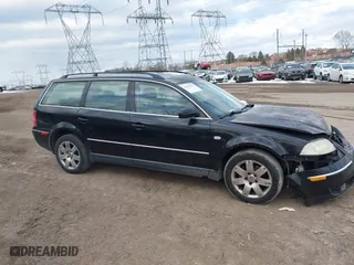 2003 Volkswagen Passat GLX with VIN WVWYH63B23E073924, listed as a IAAI auction lot 41447079 with 160,263 mi miles. Bid and sale history available at carsss.com. Image 1.