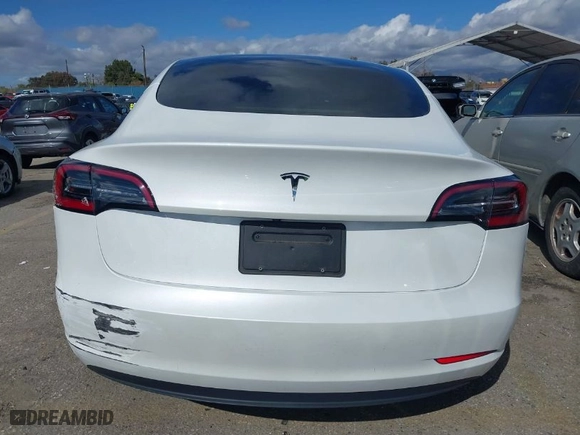 2023 Tesla Model 3 with VIN 5YJ3E1EA6PF488405, listed as a IAAI auction lot 41570896 with 26,631 mi miles. Bid and sale history available at carsss.com. Image 17.