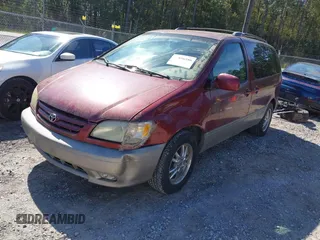 2001 Toyota Sienna LE with VIN 4T3ZF13C61U336492, listed as a IAAI auction lot 41896586 with 191,571 mi miles. Bid and sale history available at carsss.com. Image 2.