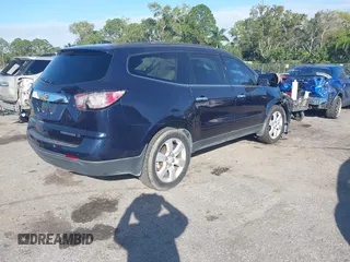 2016 Chevrolet Traverse LT with VIN 1GNKRGKD4GJ307061, listed as a IAAI auction lot 40880472 with 200,802 mi miles. Bid and sale history available at carsss.com. Image 4.