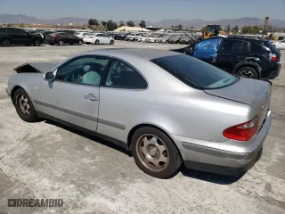 1999 Mercedes-Benz CLK-Class with VIN WDBLJ65G9XF065356, listed as a Copart auction lot 73586424 with 228,410 mi miles and Salvage Title. Bid and sale history available at carsss.com. Image 2.