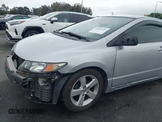 2009 Honda Civic Cpe LX with VIN 2HGFG12669H524342, listed as a IAAI auction lot 42061391 with 162,369 mi miles. Bid and sale history available at carsss.com. Image 6.