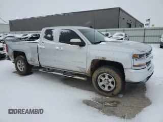 2018 Chevrolet Silverado 1500 LT with VIN 1GCVKREH8JZ280721, listed as a Copart auction lot 45921135 with 74,684 mi miles and Salvage Title. Bid and sale history available at DreamBid. Image 4.