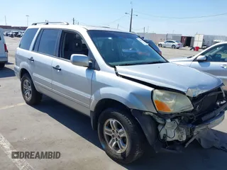 2005 Honda Pilot EX-L z VIN 2HKYF18515H550101, wystawiony jako IAAI lot #42182151 z przebiegiem 118 159 mil mil oraz . Historia ofert i sprzedaży dostępna na DreamBid. Obrazek 1.