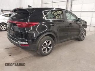 2020 Kia Sportage LX with VIN KNDPMCACXL7804797, listed as a IAAI auction lot 42011299 with 49,793 mi miles and . Bid and sale history available at carsss.com. Image 4.