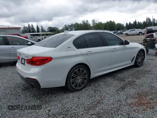 2019 BMW 5 Series 530e with VIN WBAJA9C57KB389401, listed as a IAAI auction lot 42565098 with 52,343 mi miles and . Bid and sale history available at DreamBid. Image 4.