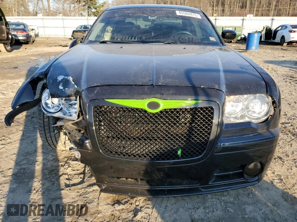 2006 Chrysler 300 C SRT8 with VIN 2C3LA73W56H450447, listed as a Copart auction lot 45502875 with 130,728 mi miles and Salvage Title. Bid and sale history available at carsss.com. Image 5.