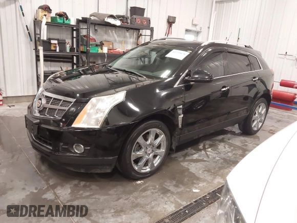 2011 Cadillac SRX Performance Collection with VIN 3GYFNEEY9BS675746, listed as a IAAI auction lot 41735676 with 113,079 mi miles and . Bid and sale history available at carsss.com. Image 2.
